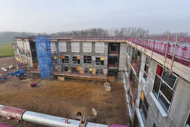 Topping out ceremony at the new Hampton Gardens secondary school with guests and staff from builders Carillion EMN-160612-153454009
