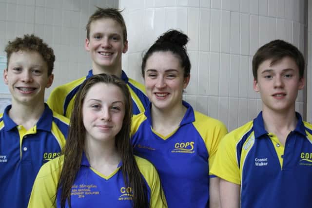 Pictured are the COPS gold medallists in Derby. From the left they are  Herbie Kinder, Amelia Monaghan, Myles Robinson-Young, Becky Burton and Connor Walker.