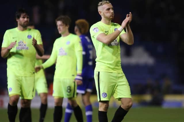 Marcus Maddison claps the 442 Posh fans at Oldham. Photo: Joe Dent/thrposh.com.