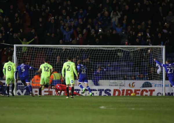 Paul Green shoots Oldham ahead from the penalty spot. Photo: Joe Dent/theposh.com.