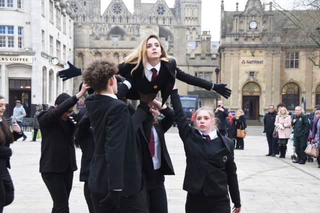 St John Fisher RC School students performing in Cathedral Square as part of Peterborough's Holocaust Memorial Day