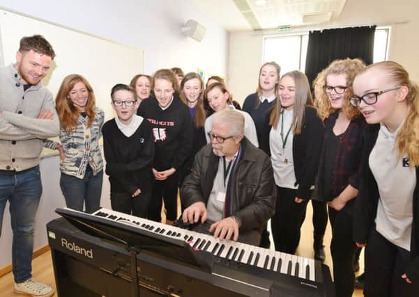 London actors  Nancy Sullivan and David Thaxton leading a drama and musical workshop with students at Ken Stimpson School. Also pictured pianist Steve Hession. EMN-170123-161938009