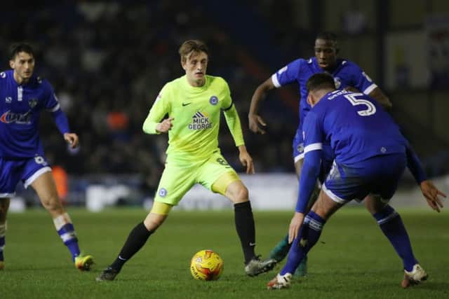 Posh skipper Chris Forrester in action during the Oldham debacle.