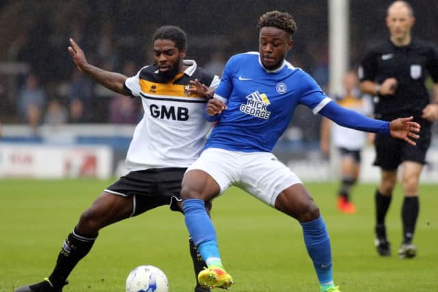 Posh are to discuss a new contract with midfielder Jermaine Anderson.