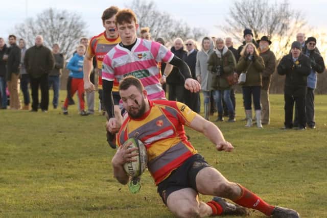 Ben Edwards crosses for a Borough try against Olney. Picture: Mick Sutterby