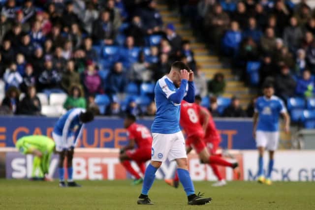 Posh forward Paul Taylor shows his disappointment after MK Dons make it 2-0. Photo: Joe Dent/theposh.com.