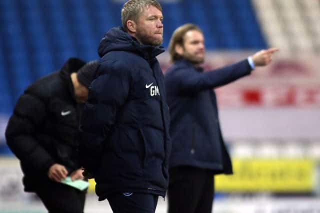 Posh boss Grant McCann watches his side be outplayed by MK Dons. Photo: Joe Dent/theposh.com.