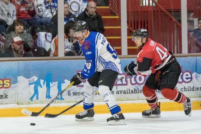Phantoms' two-goal scorer Ales Padelek controls the puck from Basinsgtoke's Tomas Karpov. Photo: Tom Scott - AMOimages.com.