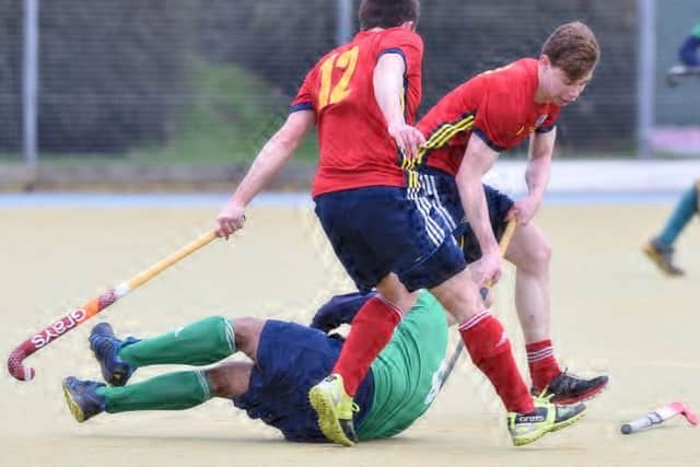 City of Peterborough man-of-the-match James Fisher (right) is about to emerge with the ball in the comfortable East Premier A Division win over Chelmsford. Photo: David Lowndes.
