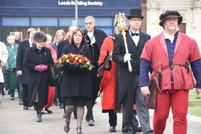 Katharine of Aragon service of commemoriation at Peterborough Cathedral. Local school children processing from St John's Church through city centre to the service. EMN-170127-165309009
