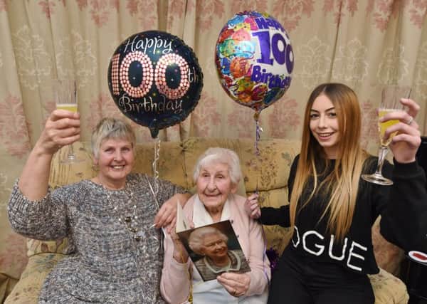 100 year-old  Gladys Elam with daughter Carole Hudson (70) and great granddaughter Rebecca Jardine (16) who also had birthdays in the same week. EMN-170126-090532009