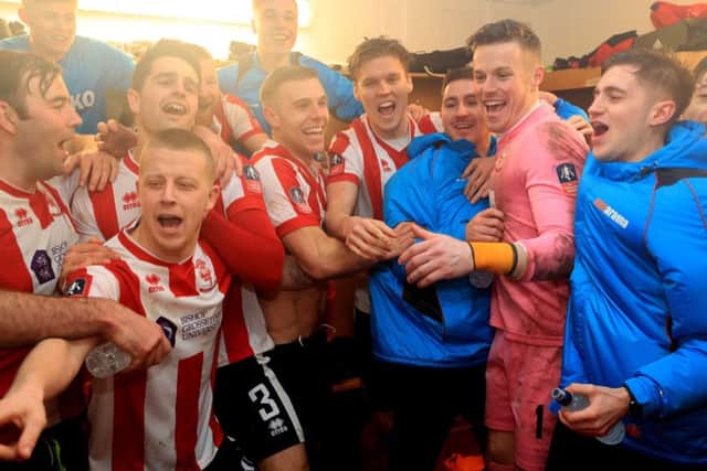 Lincoln City celebrate beating Brighton's reserve team.