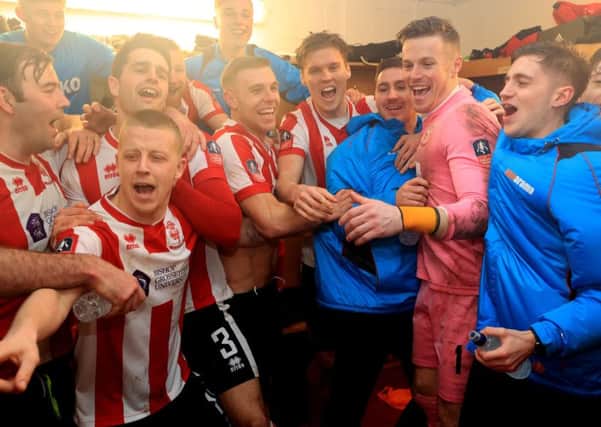 Lincoln City celebrate beating Brighton's reserve team.