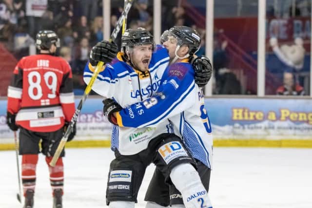 Tom Norton celebrates a powerplay strike with Ales Padelek. Picture: Tom Scott