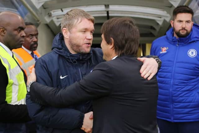 Posh manager Grant McCann left a good first impression on Anthony Grant.