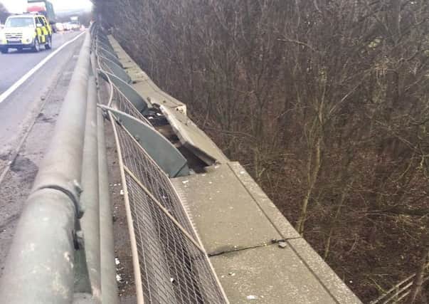 Damage to the bridge on the A14 this afternoon - Photo: @roadpolicebch