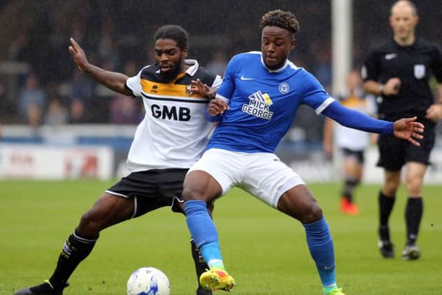 Anthony Grant (left) should make his Posh debut at his former club.