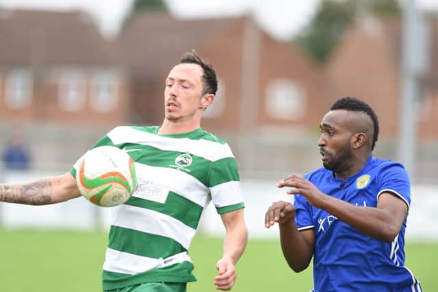 Avelino Vieira (right) scored his 100th goal for Peterborough Sports last weekend.