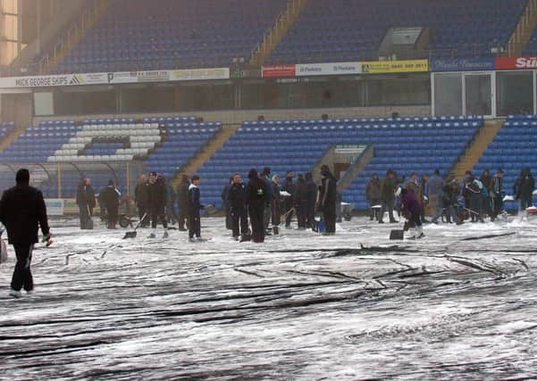 A snow-covered playing surface at the ABAX Stadium.