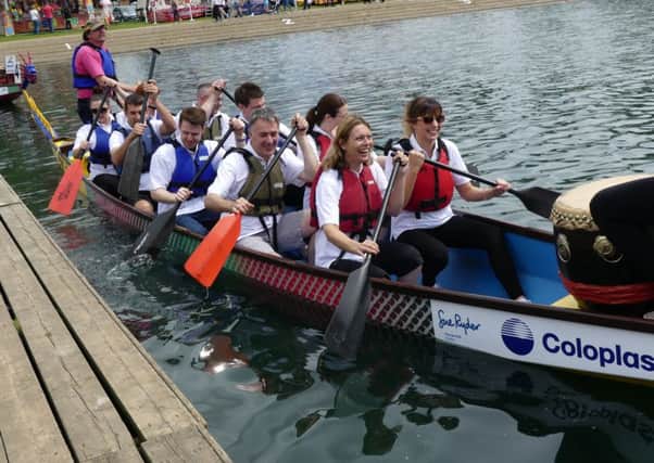 Coloplast staff involved in last year's fundraising boat race.
