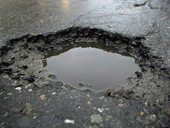 Report pothole problems online