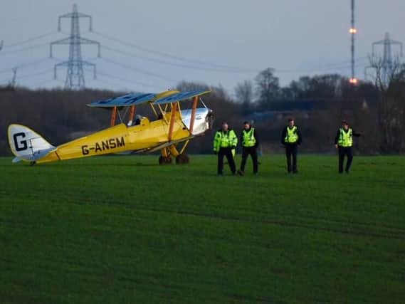 Emergency services at the scene of the light aircraft crash