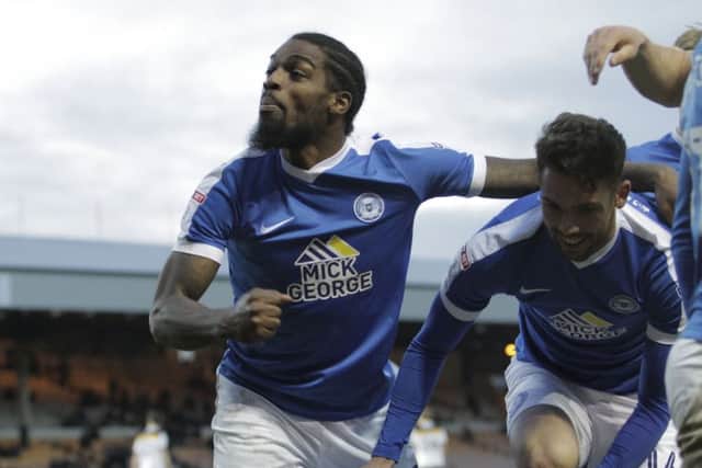 Debutant Anthony Grant (left) and Brad Inman celebrates the third Posh goal at Port Vale scored by Junior Morias. Photo: Joe Dent/theposh.com.