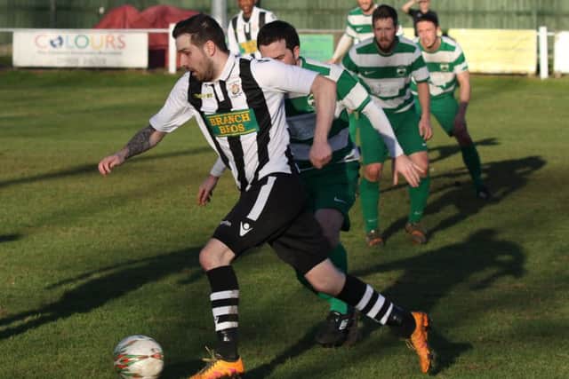 Matt Barber bursts forward for Peterborough Northern Star at Newport Pagnell.
