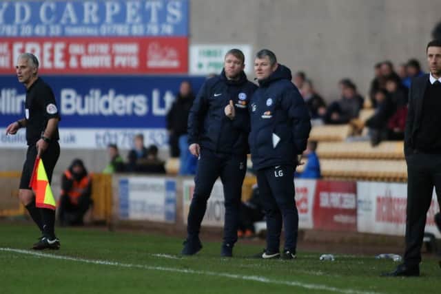 Posh manager Grant McCann and his assistant Lee Glover during the win at Port Vale. Photo: Joe Dent/theposh.com.