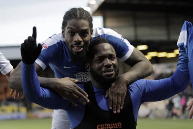 Junior Morias celebrates his first Posh goal with debutant Anthony Grant. Photo: Joe Dent/theposh.com.
