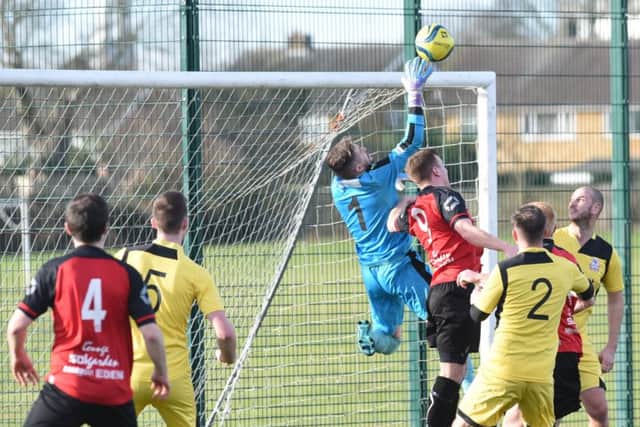 Action from Netherton United's County Cup semi-final defeat to Raunds at the Grange. Photo: David Lowndes.