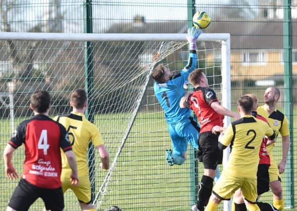 Action from Netherton United's County Cup semi-final defeat to Raunds at the Grange. Photo: David Lowndes.