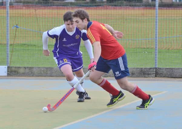 Joe Finding (right) claimed a hat-trick for City of Peterborough in a 4-3 win at Cambridge University.