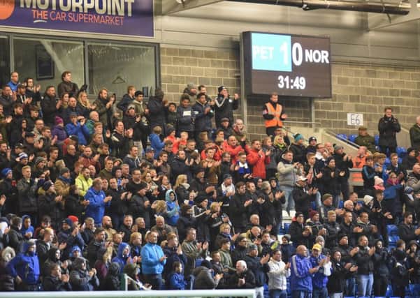 Part of the Posh crowd at the game against Northampton at the ABAX Stadium.