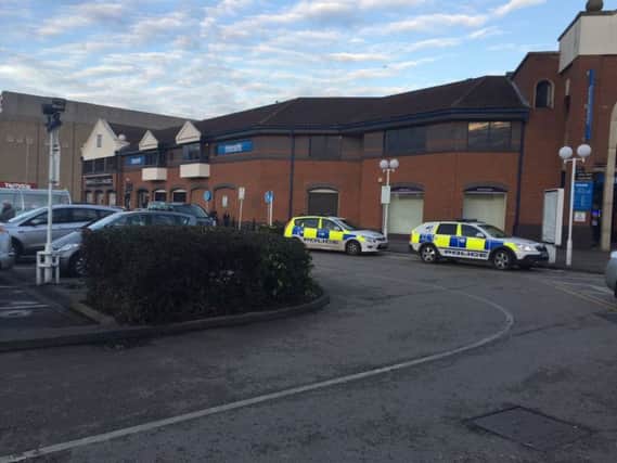 Police at the scene of the incident at Rivergate Arcade