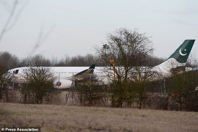 A Pakistan International Airlines plane at Stansted Airport after being intercepted by the RAF after reports of a disruptive passenger onboard. pa-news-20170207-163505-air_stan