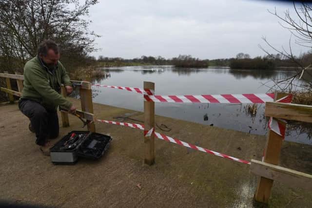 Paul Easthope. estate warden, inspects the damage