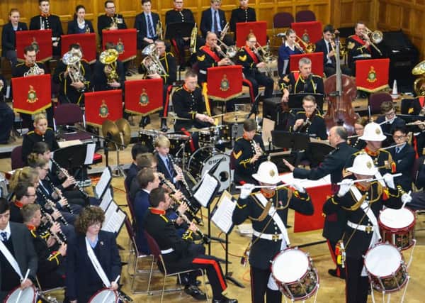 Musicians with the Oundle School CCF band and the Band of Her Majestys Royal Marines.