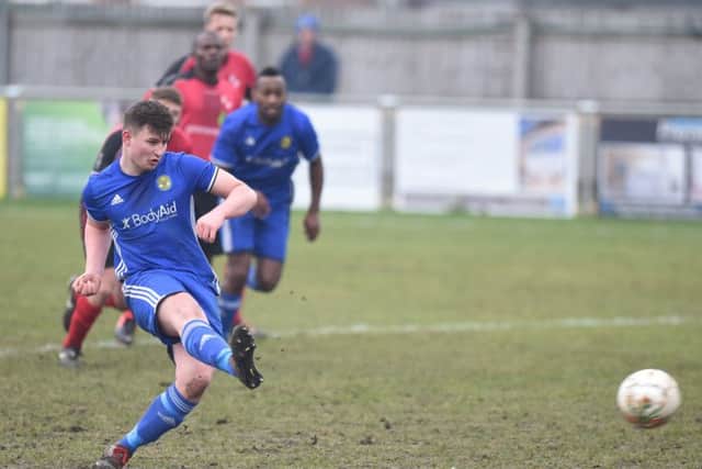 Josh Sanders fires Peterborough Sports ahead from the penalty spot against Sileby. Photo: David Lowndes.