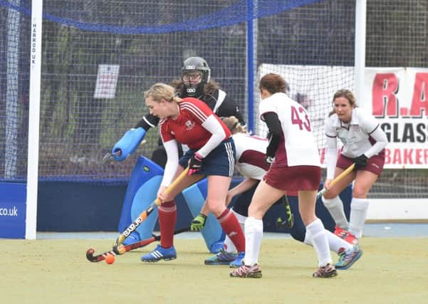 Action from City of Peterborough Ladies (red) v Milton Keynes. Photo: David Lowndes.
