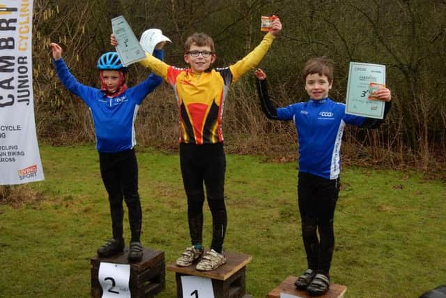Harry Tozer on top of the podium.