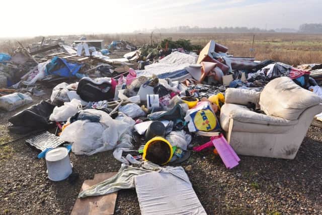 Flytipping along Storey's Bar Road Fengate in two spots. EMN-170602-141350009