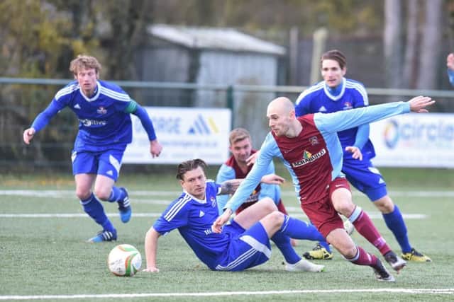 Deeping Rangers (claret) have already won at Yaxley in the United Counties Premier Division.