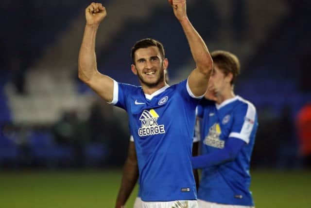 Posh central defender Dominic Ball is a happy man after scoring the first goal of his career against Shrewsbury. Photo: Joe Dent/theposh.com.