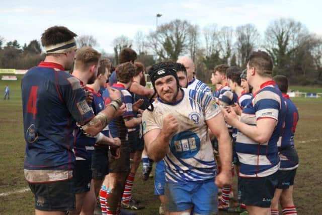 Chris Humphrey leads his triumphant Lions team off the Sheffield pitch. Picture: Mick Sutterby