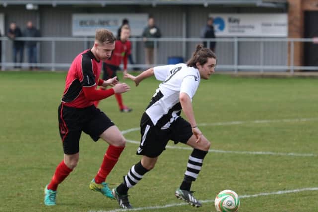 Kieron Blanchard (white) in action for Peterborough Northern Star at Sileby. Photo: Tim Gates.