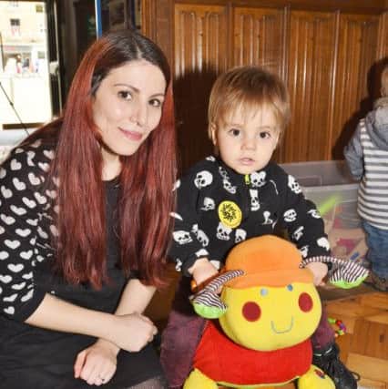 One Day with Us event at St John's church, Cathedral Square. Pictured is Liliana Cardoso with her son Killian (1). EMN-170220-160221009