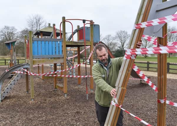 Vandalism  of play equiptment, benches and fencing at Ferry Meadows. Pictured is estate warden Paul Easthope EMN-170902-173328009