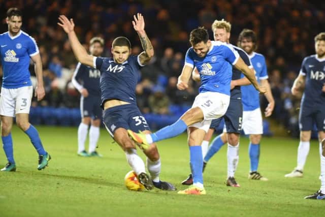 Posh centre back Ryan Tafazolli shoots at the Southend goal. Photo: David Lowndes.