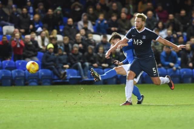Substitute Tom Nichols fires home the Posh consolation goal against Southend. photo: David Lowndes.